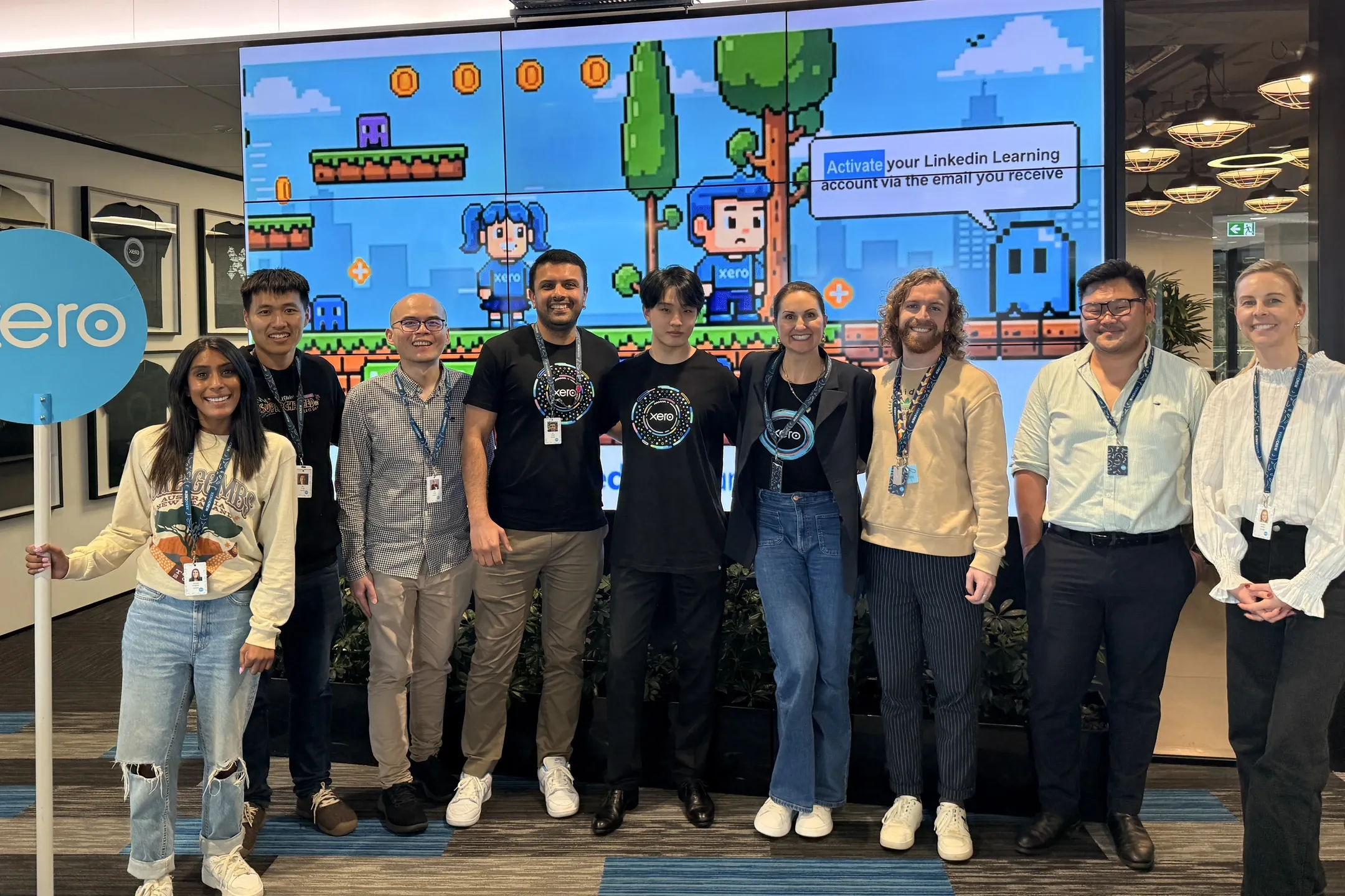 Jeffrey Lin with a group at a Xero office.
